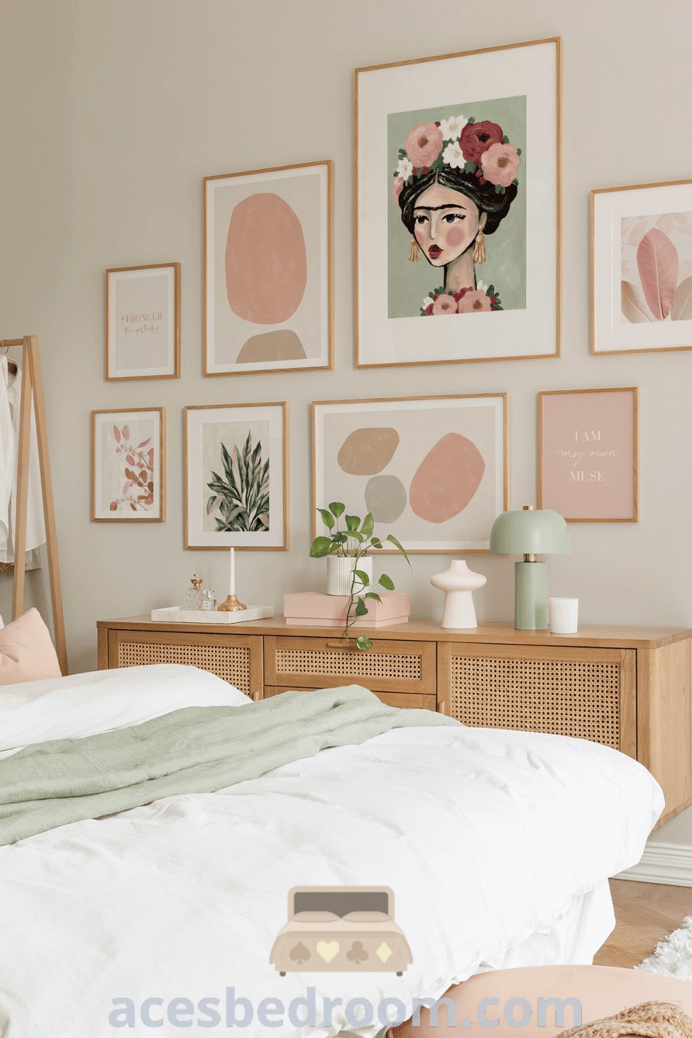 A cozy bedroom with pictures on the wall above the bed, offering unique decor inspirations for a warm and sophisticated look. Explore more design ideas to enhance your home at acesbedroom.com.